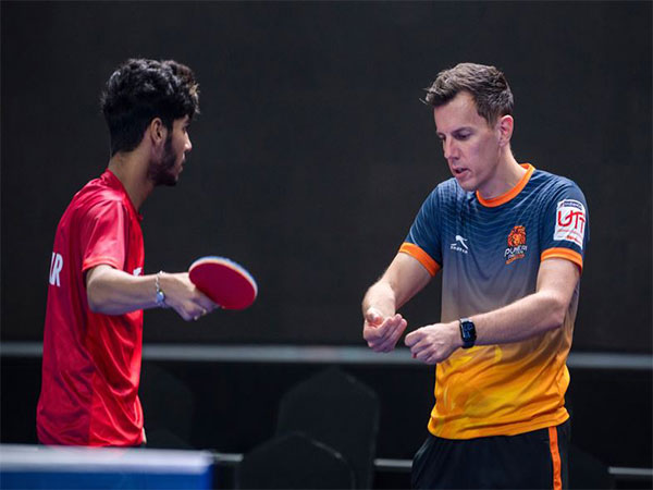 Ankur Bhattacharjee (left) with coach (Photo: UTT) 