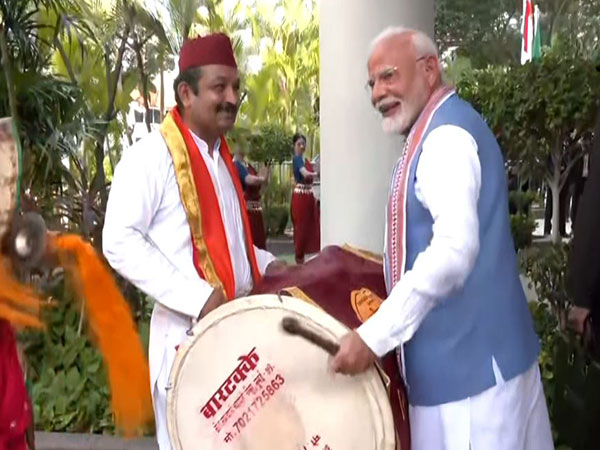 Prime Minister Narendra Modi trying his hands at drums (Photo/ANI)