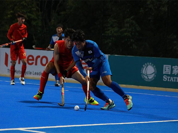 South Korea and China in action. (Photo- AHF/Hockey India)