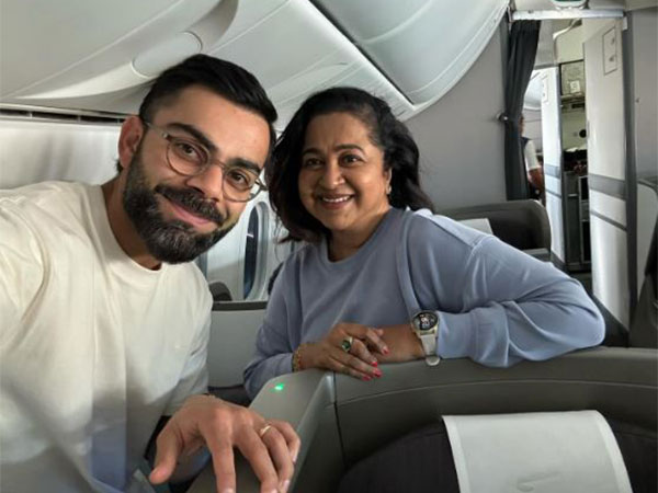 Virat Kohli with Radhika Sarathkumar (image source: instagram/radikaasarathkumar)