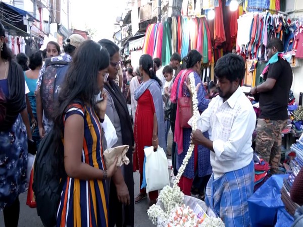 Shoppers in market on Uthrada Pachil (Image source/ANI) 