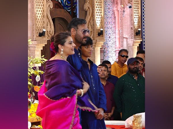 Ajay Devgn offers prayers at Durga Puja pandal with wife Kajol, son Yug