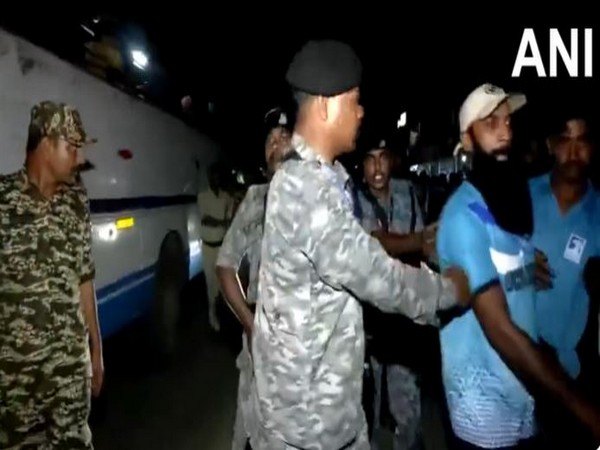 Clash between CRPF, Congress workers during Priyanka Gandhi's roadshow in Wayanad (Photo/ANI)
