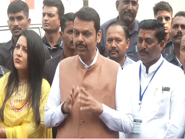 Maharashtra Deputy Chief Minister Devendra Fadnavis along with wife Amruta Fadnavis. (Photo/ ANI)