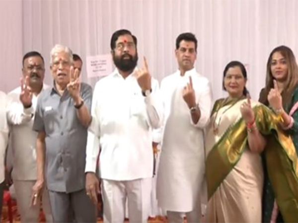 Chief Minister Eknath Shinde along with family displaying their inked fingers after voting. (Photo/ ANI)