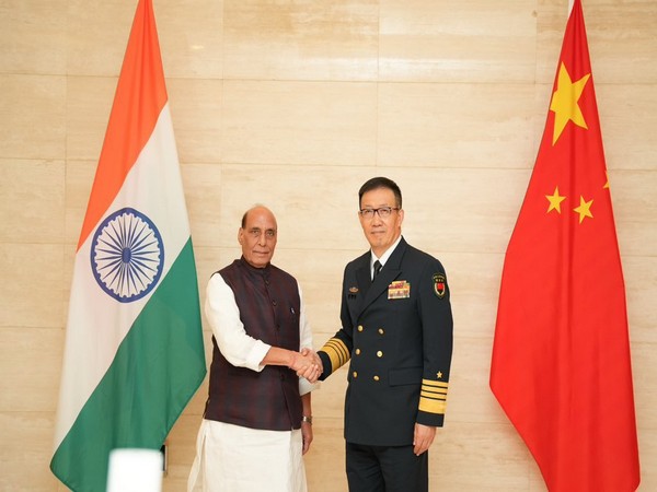 Defence Minister Rajnath Singh with his Chinese counterpart Dong Jun (Photo/@SpokespersonMoD)
