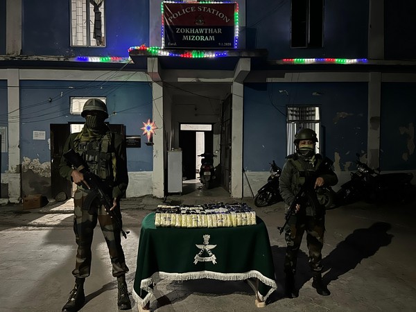 Security personnel with seized drugs (Photo/Assam Rifles)