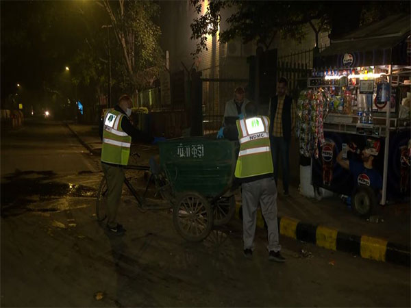 New Delhi Municipal Corporation (NDMC) begins night cleaning and sweeping of roads, at various locations in the national capital (Photo/ANI)