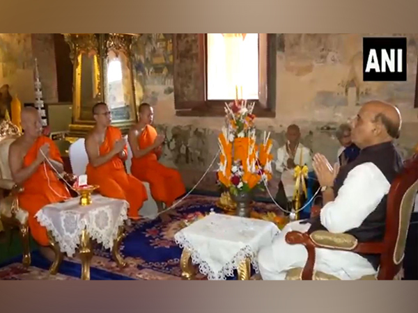 Defence Minister Rajnath Singh at Wat Si Saket - a Buddhist temple (Photo/ANI)