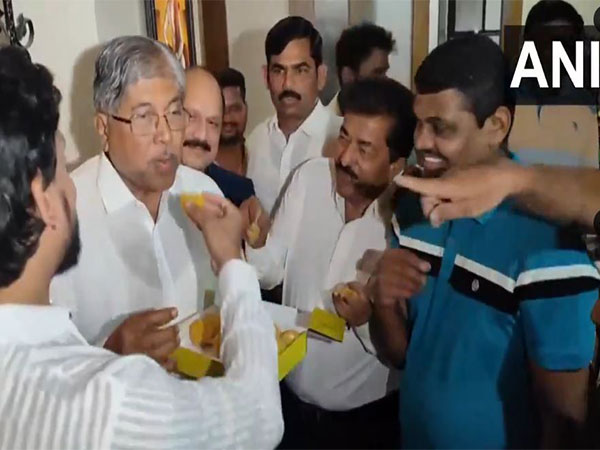  BJP's Chandrakant Patil celebrate with party members on Saturday. (Photo/ANI)