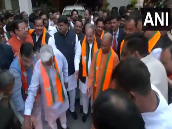 Uttar Pradesh CM Yogi Adityanath celebrated outside the BJP office after the UP by-poll results (Photo/ANI)