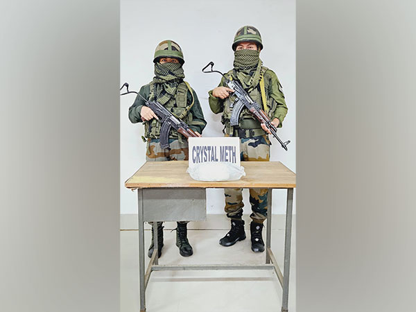 Assam Rifles with seized drugs. (Photo/ANI)