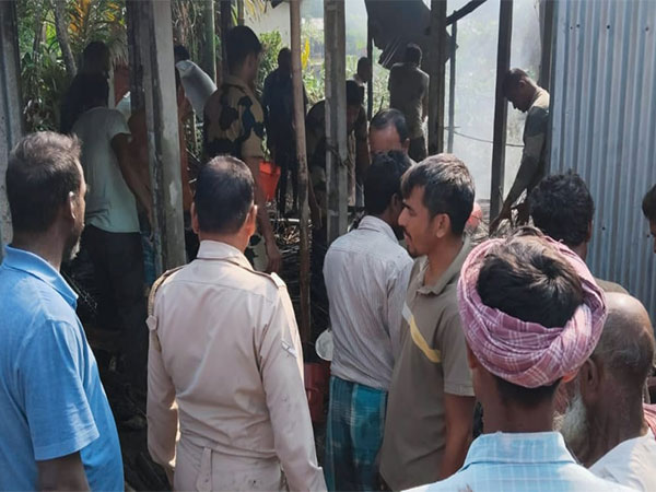 BSF personnel assisting in an emergency fire incident in a village in Assam.(Photo/BSF Guwahati Frontier)