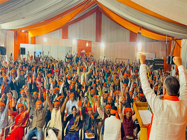 BJP Purvanchal Morcha President Santosh Ojha speaking at the event. (Photo/ANI)