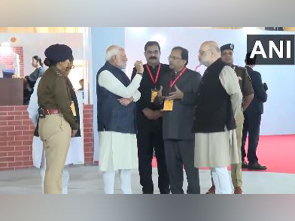 Prime  Minister Narendra Modi and Home Minister Amit Shah at exhibition (Photo/Screengrab of DD News)
