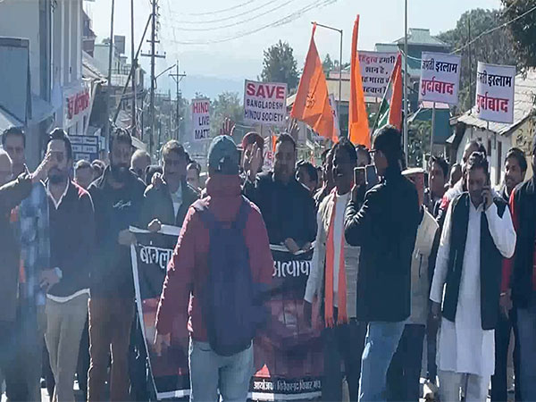 People hold protest against Bangladesh in Dharamshala (Photo/ANI)