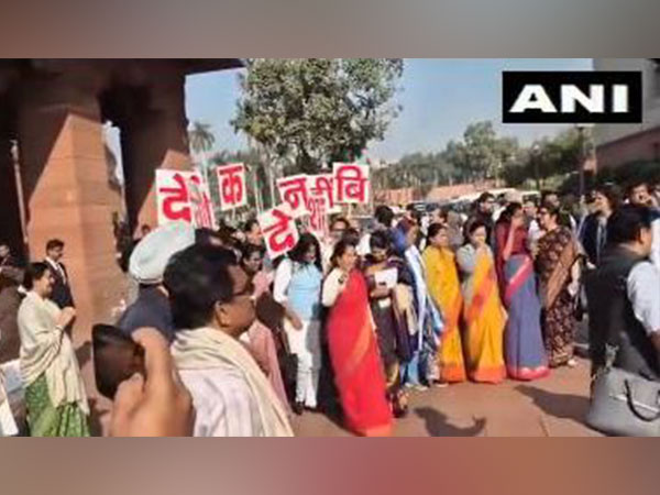 Opposition MPs protest against  Centre over the Adani issue on Parliament premises (Photo/ANI)