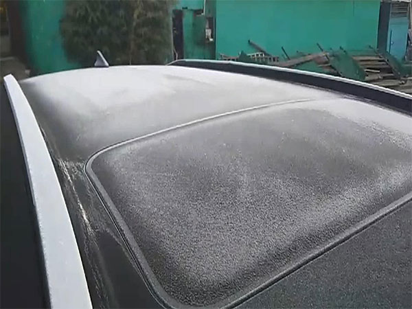A layer of frost forms on a car in Mout Abu (Photo/ANI) 