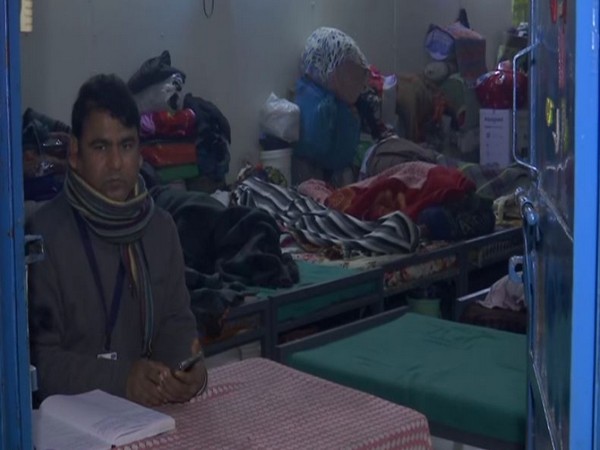 Caretaker at a night shelter at Lodhi Road. (Photo/ANI)