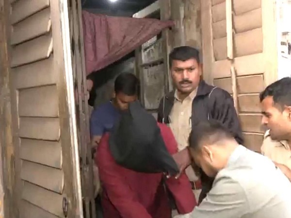 Javed Munshi taken away from the court by Police. (Photo/ANI) 