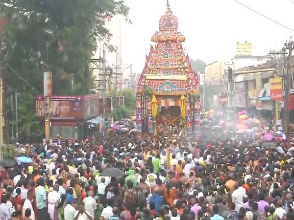 A large number of devotees attend the Margazhi Ashtami Chariot Festival at the Meenakshi Amman Temple in Madurai(Photo/ANI)