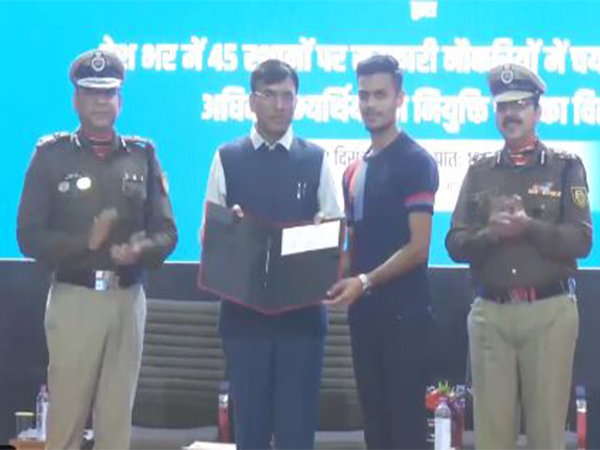 Union Minister Dr. Mansukh Mandaviya distributes government job appointment letters at Rozgar Mela in Gandhinagar BSF campus.(Photo/ANI)