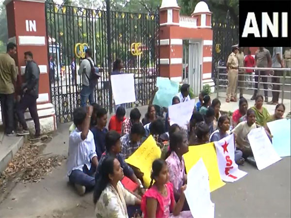 Members of SFI and All India Women Welfare Federation protest outside the Anna University campus. (Photo/ANI)