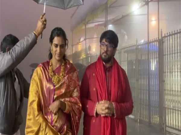 PV Sindhu with her husband Venkata. (Photo- ANI)