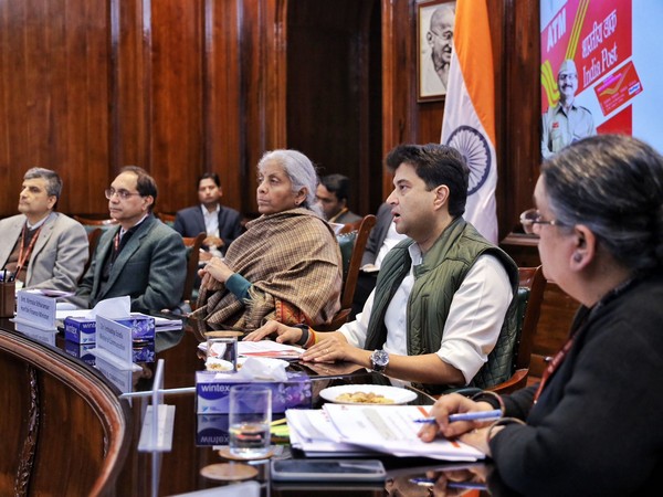 Jyotiraditya Scindia and Nirmala Sitharaman along with officials (Photo/ANI)