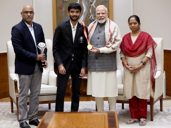 Prime Minister Narendra Modi with D Gukesh and his parents