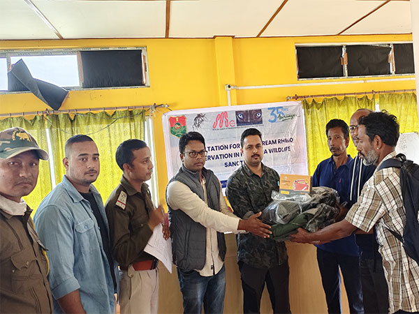 Forest department officials with conservation organization Aranyak team  (Photo/ANI)