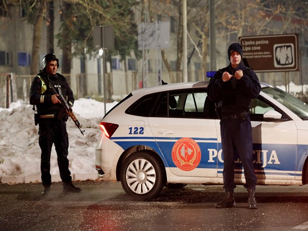   Police stand on a checkpoint near where a gunman opened fire at a restaurant and killed several people in Cetinje, Montenegro, (Photo: Reuters)