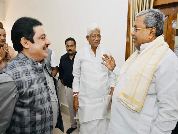 Chief Minister Siddaramaiah with State Housing Minister Zameer Ahmed Khan (Photo/ANI)