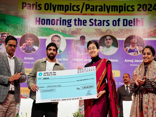 Chief Minister Atishi awarded a cheque of Rs 1 crore to Aman (Photo/ANI)