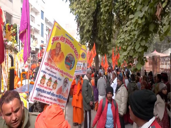 Procession of devotees travelling to Sangam Ghat (Photo/ANI)