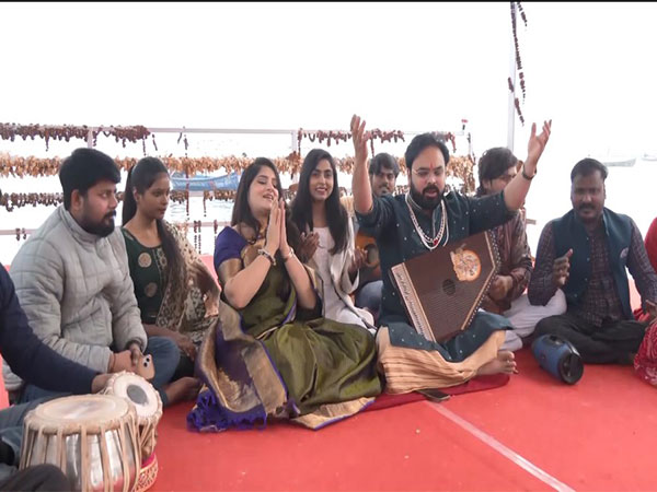 Musical troupe perform at Sangam Ghat (Photo/ANI)