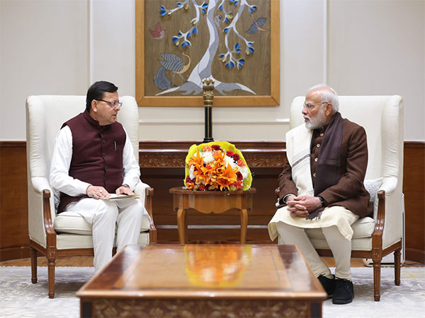 Uttarakhand Chief Minister Pushkar Singh Dhami with Prime Minister Narendra Modi (Photo/ANI)
