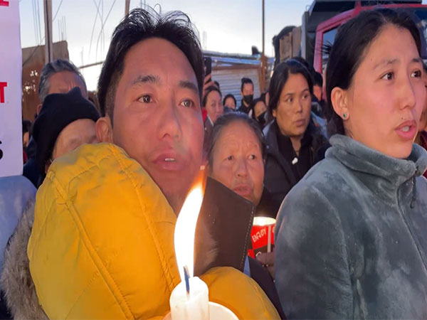 Tibetans in-exile hold candlelight vigil (Photo/ANI)