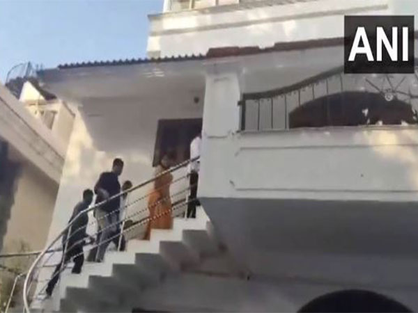 BRS MLC K Kavitha along with her husband Anil Kumar reaches KT Rama Rao's residence in Nandinagar.(Photo/ANI) 