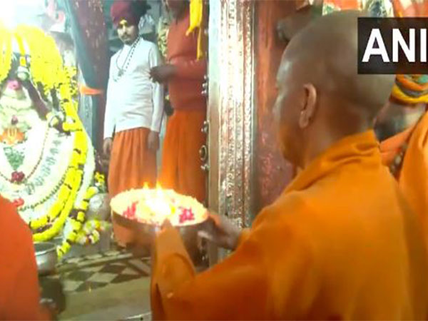 Uttar Pradesh CM Yogi Adityanath offers prayers at Hanumangarhi temple in Ayodhya (Photo/ANI)
