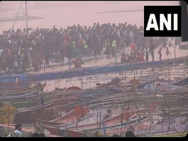 Devotees taking dip at Triveni Sangam ahead of MahaKumbh 2025 (Photo/ANI)
