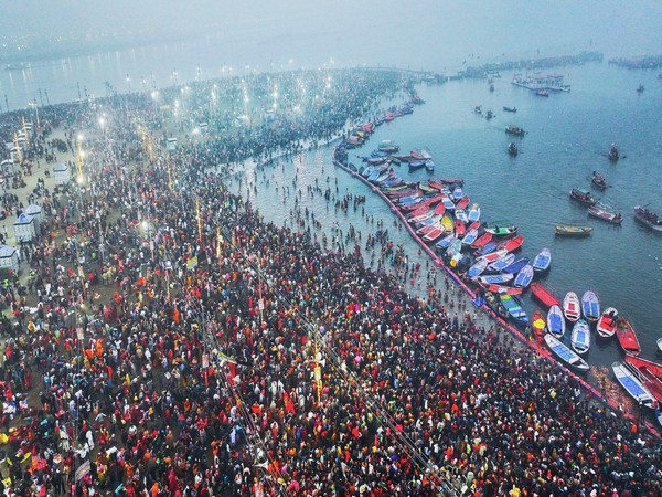 Devotees gather to take holy dip at Sangam. (Photo/ANI)