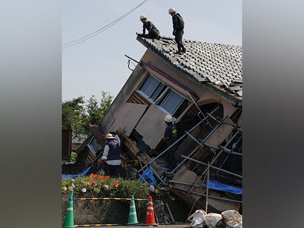 Rescuers work on a house collapsed following an earthquake hit in Osaki town, in southwestern Japan on August 9, 2024 (Photo credit/Reuters)