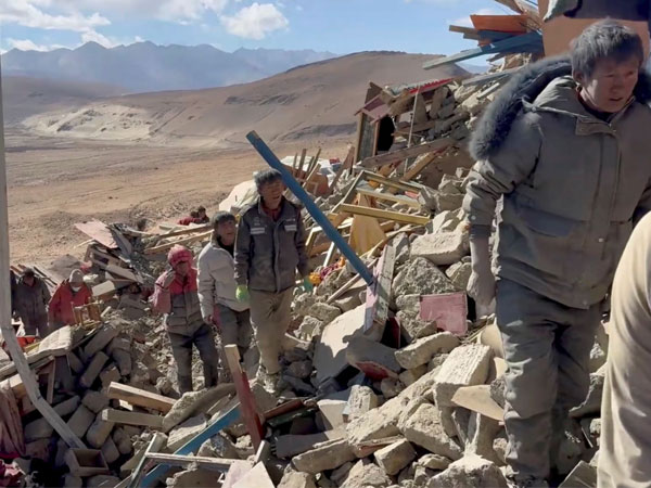 Rescue teams work amidst rubble in the aftermath of Tibet earthquake (Photo credit: Reuters)
