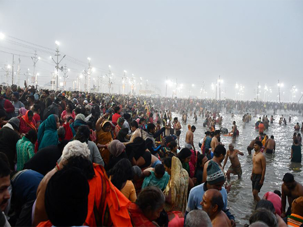 Devotees took dip at Triveni Sangam on the occasion of ‘Paush Purnima’ during the Maha Kumbh 2025, in Prayagraj on Monday. (Photo/ANI)