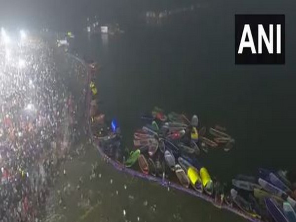 Drone visuals of devotees taking a dip at the Triveni Sangam (Photo/ANI)