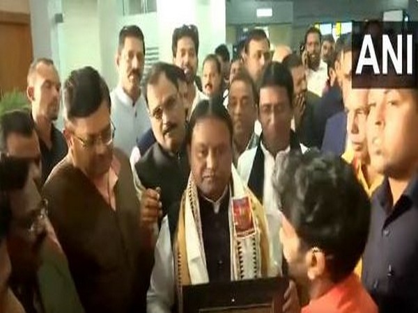 Odisha CM Mohan Charan Majhi accorded a warm welcome by locals at the Bhubaneswar airport on Tuesday. (Image/ANI)