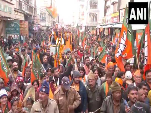 A road show organized in support of BJP candidates of Rudrapur.(Photo/ANI)