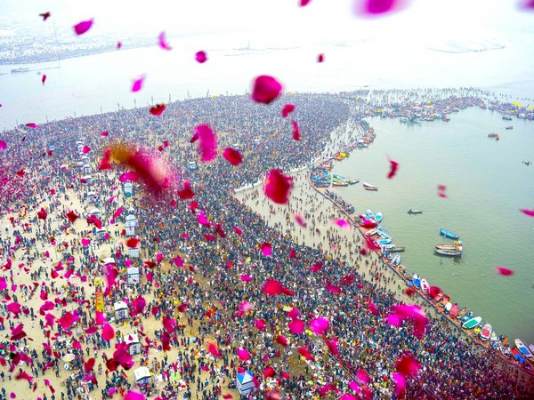 Flower petals being showered on devotees at Maha Kumbh 2025. (Photo/ANI)