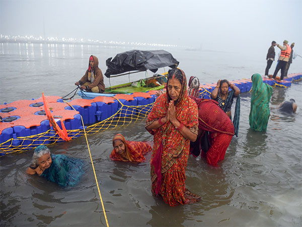 Devotees at Triveni Sangam in MahaKumbh (Photo/ANI)
